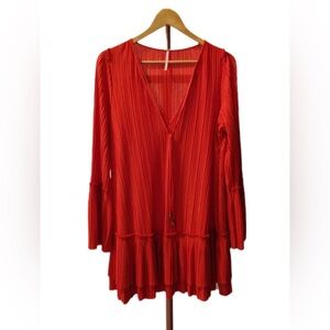Free people size small/petite. Worn once very roomy beautiful piece.